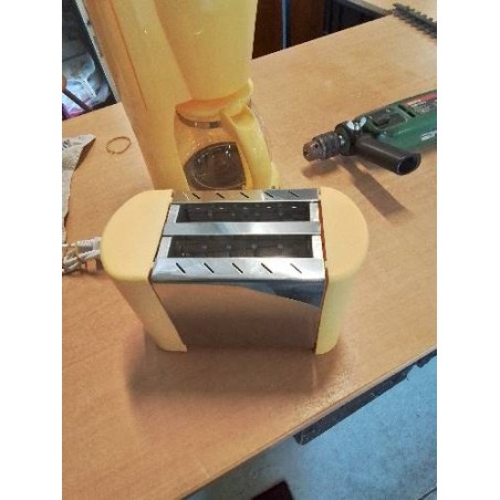 GRILLE PAIN INOX JAUNE