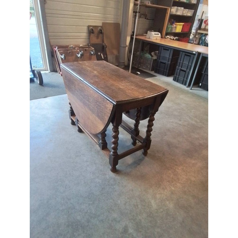 TABLE OVALE A ABATTANTS BOIS PIÈTEMENT TOURNÉS 