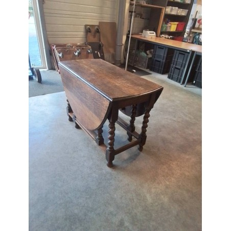 TABLE OVALE A ABATTANTS BOIS PIÈTEMENT TOURNÉS 