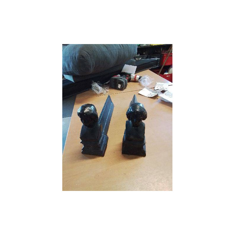 PAIRE DE CHENETS ANTHOPROMORPHE FONTE