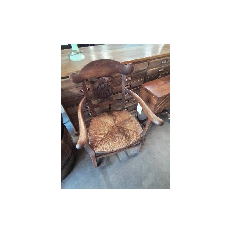 FAUTEUIL DE CHEMINÉE BOIS PAILLÉ DOSSIER SCULPTÉ AUX FLEURS XIXE