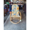 ROCKING CHAIR TISSU ASSISE TISSU JAUNE AUX FLEURS BLEUES