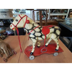 CHEVAL A ROULETTES CARTON...