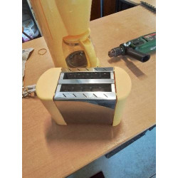 GRILLE PAIN INOX JAUNE